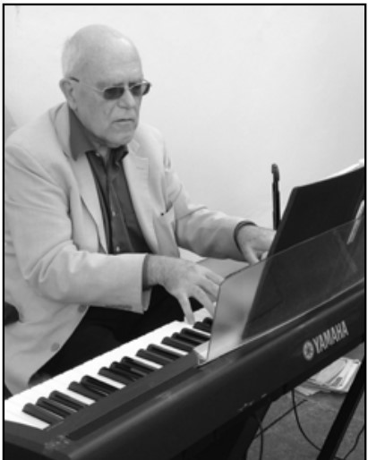 Malcolm Rudland at the keyboard